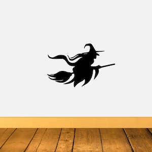 Halloween witch on a broom decal sticker by DecalTheory on Etsy