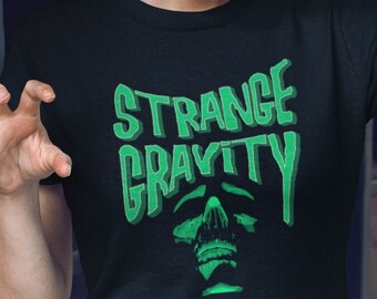 Strange Gravity Horror T-Shirt: Green Skull, Dark Humor