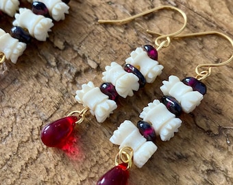 Bad to the Bone ~ Upcycled skeletal Halloween, spine and blood drop dangles on gold plated earrings. Art Deco vintage beads, with garnet.