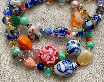 Coral Seas ~Reworked beaded bracelets- Vintage glass, porcelain, antique enamel, maximalist blues, warm oranges, gemstones, sustainable gift