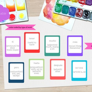 May include: Color-coded flashcards with rounded corners featuring Spanish vocabulary words and their English translations. The words are: él/ellos (he/them), tener (to have), mucho (much, many), cosa (thing), pero (but, yet), hasta (until, up to), después (after), un/una (a, an).