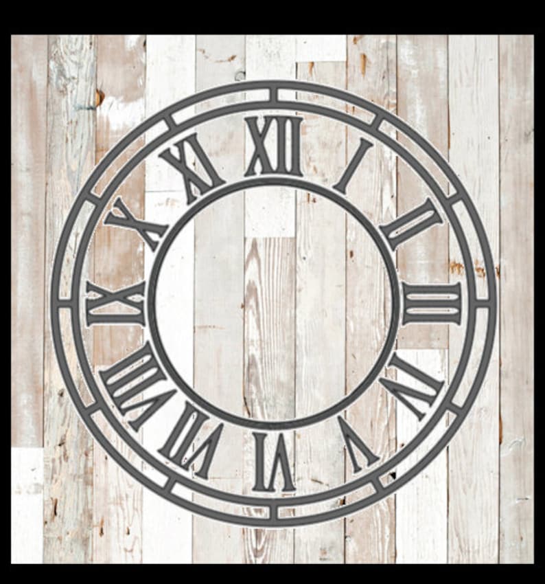 May include: A gray metal clock face with Roman numerals against a white and light brown wooden background. The clock face is circular with the numbers I through XII. The background has a rustic, weathered appearance.