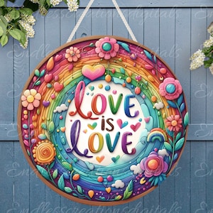 May include: A round wooden sign with a rainbow design and the text "Love is Love" in colorful letters. The rainbow is surrounded by flowers and hearts.