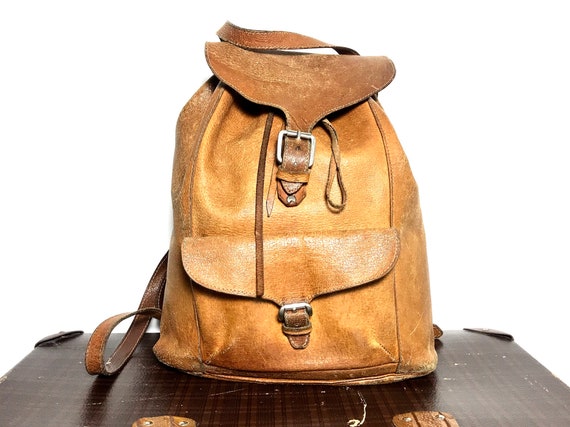 distressed leather backpack