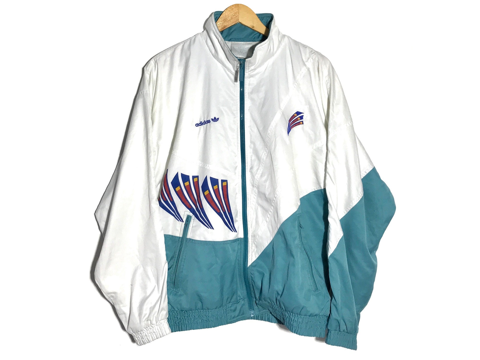 white adidas track top