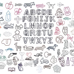 May include: A collection of colorful paperclips shaped into various objects, including letters of the alphabet, animals, and other designs. The paperclips are made of metal and are approximately 1 inch in length.