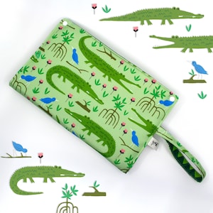 Cambiador de bebé de cocodrilo verde, bolso de viaje portátil para pañales, cambiador impermeable, verzorgingsmatje - diseño de Heleen van den Thillart