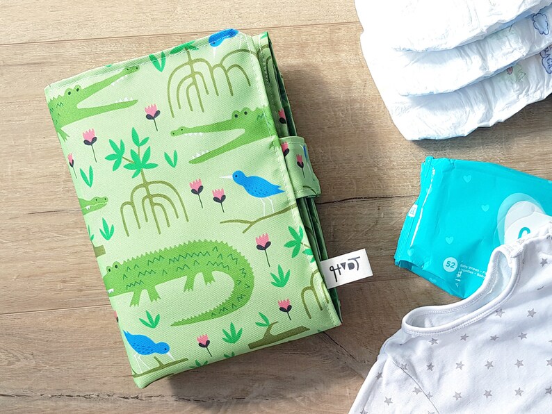 green baby changing mat