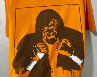 ヴィンテージ 2002 ECW タズ Tシャツ「Survive If I Let You