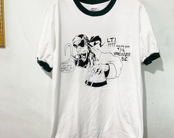 Camiseta vintage de los 90 con diseño de piratas de Vancouver Comics, talla M