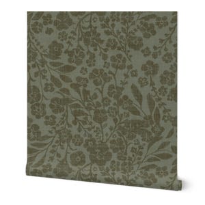 Olive green floral wallpaper with detailed, intricate flower and leaf patterns. The design feels vintage and elegant, evoking a natural, calming tone.