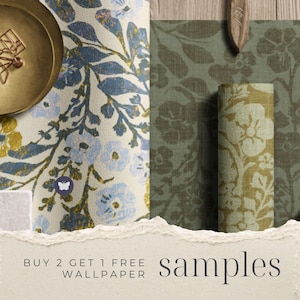 May include: Two wallpaper samples featuring floral patterns. One sample has a cream background with blue and gold flowers, while the other is olive green with tonal floral prints. Text at the bottom reads: BUY 2 GET 1 FREE WALLPAPER samples.