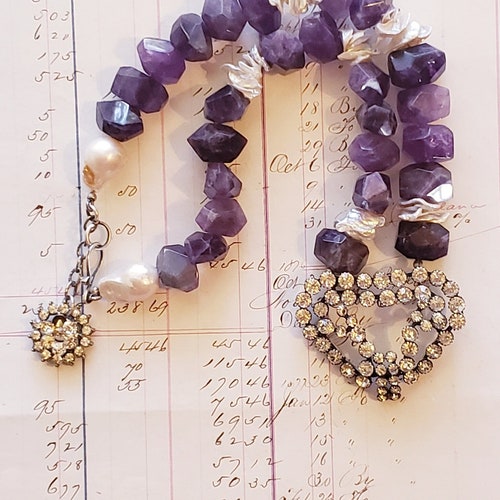 Incredible silver rhinestone heart with amethyst shops nuggets & keishi pearls.