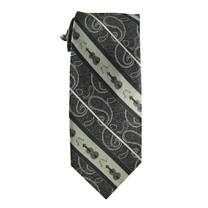 May include: A dark green and cream striped tie with a paisley pattern and a repeating image of a violin.