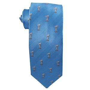May include: A light blue tie with a repeating pattern of gray stylized images. The tie has a diagonal textured weave and is knotted at the top, showcasing the pattern's design.