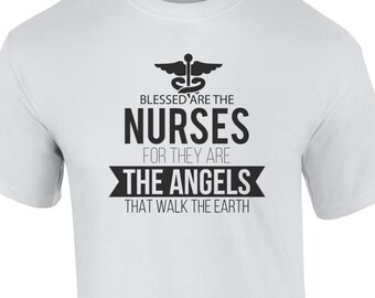May include: White t-shirt with a black graphic that reads "Blessed are the Nurses for they are the Angels that walk the earth". The graphic also includes a caduceus symbol.