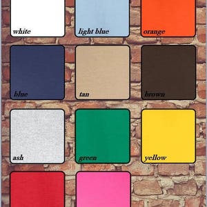 Puede incluir: Una tabla que muestra 12 muestras de tela de diferentes colores. Los colores son blanco, azul claro, naranja, azul, marr&oacute;n claro, marr&oacute;n, gris claro, verde, amarillo, rojo, rosa y negro.