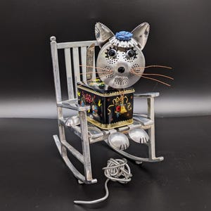 Upcycled Metal Cat Sculpture on Rocking Chair: Assemblage Art