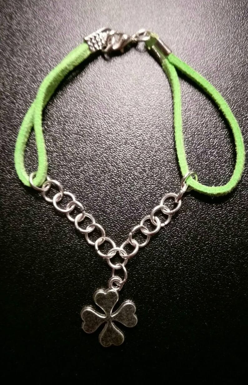 Green suede bracelet with shamrock charm