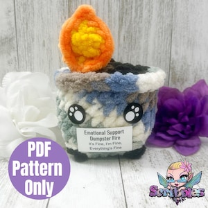May include: A crochet pattern for an emotional support dumpster fire. The pattern is for a plush toy shaped like a fire with a black, white, and blue striped body and an orange flame on top. The toy has a white face with two black eyes and a black mouth. The text on the toy reads "Emotional Support Dumpster Fire It's Fine, I'm Fine, Everything's Fine."