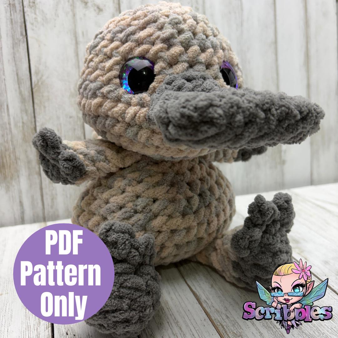 32 Platypus Crochet Patterns for Cute Aussie-Inspired Amigurumi Projects 26 Percy the Platypus Lil' Big Foot Sitting Crochet