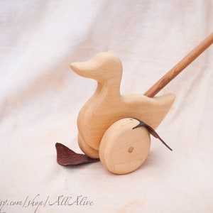 Flappy duck push toy deals
