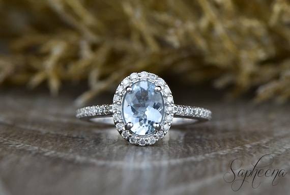 Aquamarine halo hotsell engagement ring
