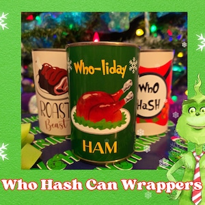May include: Three Christmas-themed can wrappers. The center can is green with a roasted ham illustration and the word "HAM". The other two cans have illustrations of a roast and the words "Roast Beast" and "Who HaSH". A green Grinch character is in the background.