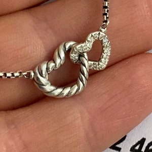 Eerder gebruikte David Yurman diamanten ketting met dubbel hart