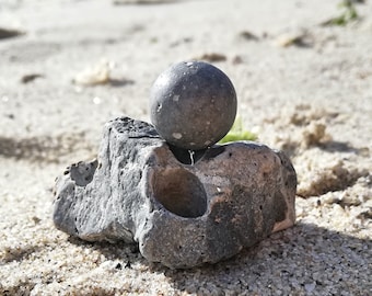Set Cristal de mar de color gris mármol y piedra bruja con agujeros de una forma interesante