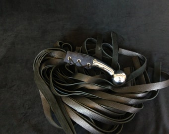 Heavy handled Hame Ball Flogger w/ 30 falls in heavy weight leather. Including an indigo blue corset under chromed brass