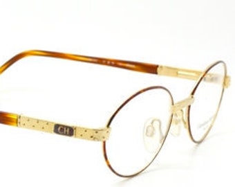 Carolina Herrera Oval 701 Designer Eyewear Vintage Eyeglasses In A Gold And Tortoiseshell Finish