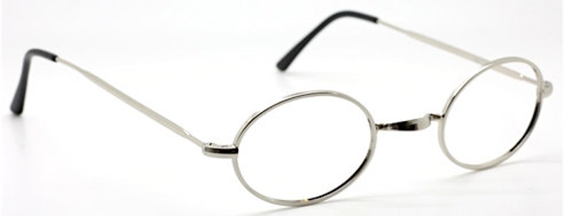 May include: Silver oval-shaped eyeglasses with thin metal frames.