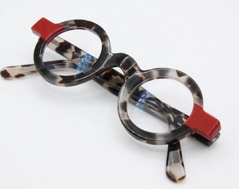Schnuchel 4030 ronde bril met schildpadeffect en rode lensgrootte van 37 mm of 42 mm met zonneclipopties B836