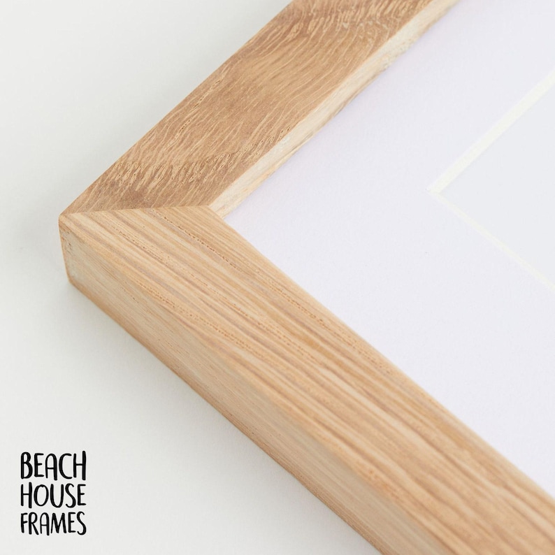 a close-up view of a wooden frame with a white background.