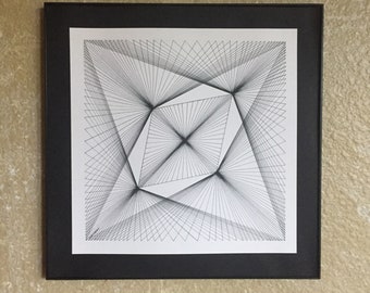 May include: A black framed print of a geometric design with intersecting lines creating a pattern of squares and triangles.