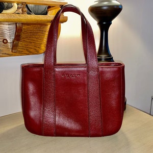 Coach Burgundy Leather Chain Baguette Bag at 1stDibs  burgundy coach  purse, coach bag burgundy, coach maroon shoulder bag