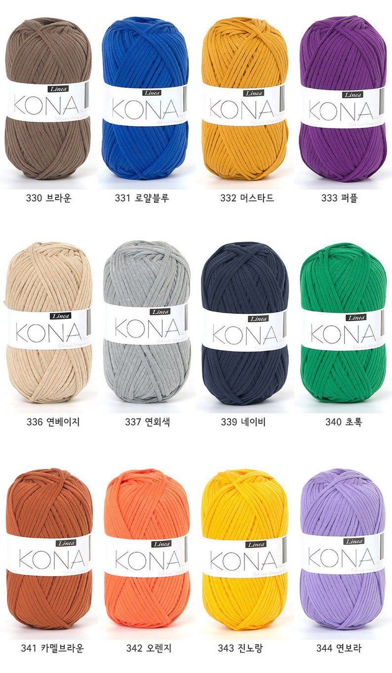May include: A collection of 10 balls of yarn in various colors, including brown, blue, yellow, purple, beige, gray, navy, green, orange, and lavender. Each ball of yarn has a label that reads "Linea Kona".