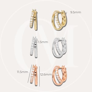 K&ouml;nnte beinhalten: Drei Paar Creolen mit einer doppelten Reihe aus klaren Zirkonia-Steinen. Die Ohrringe sind in Gold, Silber und Ros&eacute;gold erh&auml;ltlich. Die Ohrringe haben einen Durchmesser von 9,5 mm, 11,5 mm und 12,6 mm.