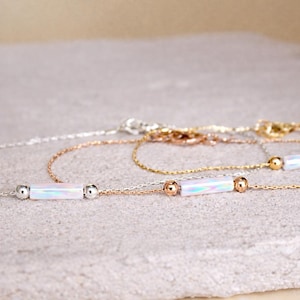 ミニマリストホワイトオパールチューブブレスレット · 14Kゴールドフィルドタイニーブレスレット · ローズゴールドオパールスネークチェーン · 春夏コレクション · 固定ビーズ