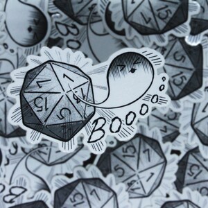 May include: A black and white illustration of a ghost saying "Boo!" while holding a 20-sided die.