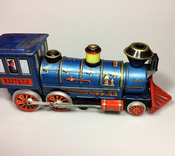 WESTERN TRAIN JAPAN Modern Toys tin litho battery operated vintage 1960s locomotive engine green gold vtg mcm trademark trade mark