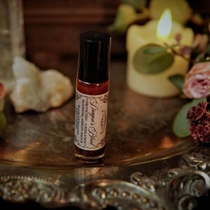 Dragon's Blood Crystal Infused Perfume Oil Roll On | Protection Oil | Strengthen Spells | Red Garnet Crystal Ritual Oil | Anointing Oil zdjęcie 15