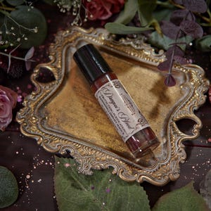 Dragon's Blood Crystal Infused Perfume Oil Roll On | Protection Oil | Strengthen Spells | Red Garnet Crystal Ritual Oil | Anointing Oil zdjęcie 13