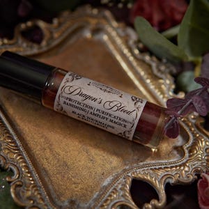 Dragon's Blood Crystal Infused Perfume Oil Roll On | Protection Oil | Strengthen Spells | Red Garnet Crystal Ritual Oil | Anointing Oil zdjęcie 4