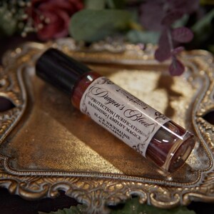 Dragon's Blood Crystal Infused Perfume Oil Roll On | Protection Oil | Strengthen Spells | Red Garnet Crystal Ritual Oil | Anointing Oil zdjęcie 8