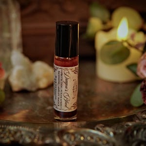 Dragon's Blood Crystal Infused Perfume Oil Roll On | Protection Oil | Strengthen Spells | Red Garnet Crystal Ritual Oil | Anointing Oil zdjęcie 5