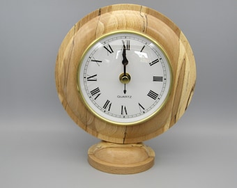 Turned clock on stand