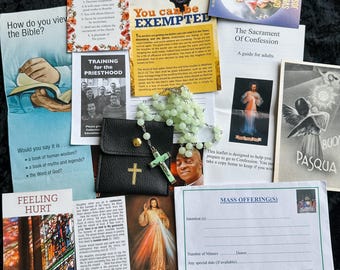 May include: Assortment of religious items including pamphlets, a rosary, and a small black leather case with a gold cross. The pamphlets have titles such as "The Sacrament of Confession" and "Mass Offering(s)".