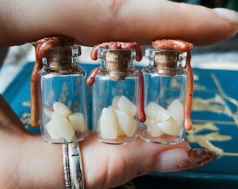 Baby teeth bottle: oddities curiosities, trinkets whimsy, memento mori mourning art, unusual gothic gift